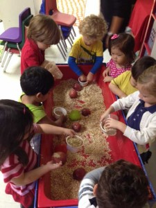 PAL kids playing at sensory table